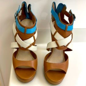 Strapped sandal heel